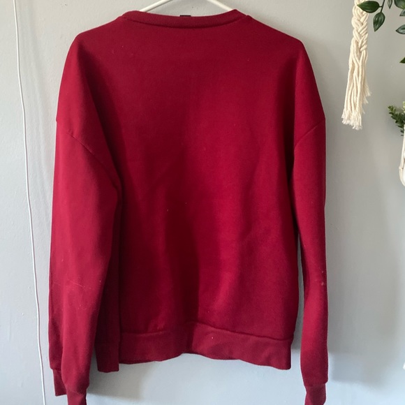 Red crewneck in a size small that’s slightly oversized - Picture 2 of 2